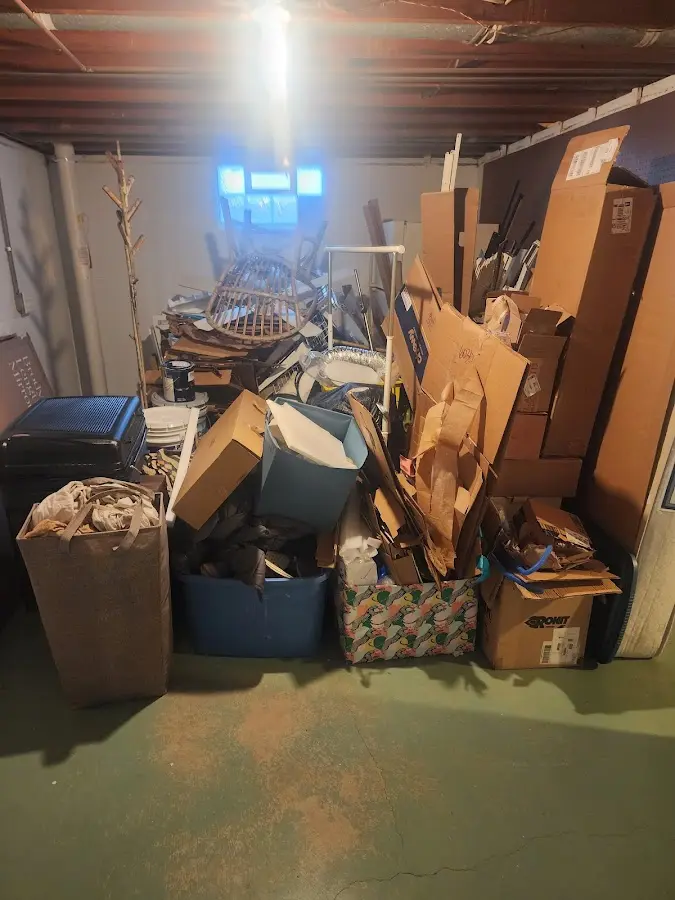 Roll-off dumpster container at job site for 4 Yard Dumpster Rental in Wilder